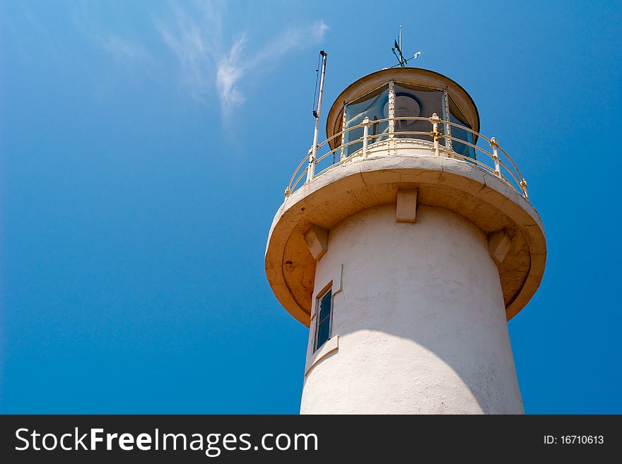 Lighthouse against a blue sky