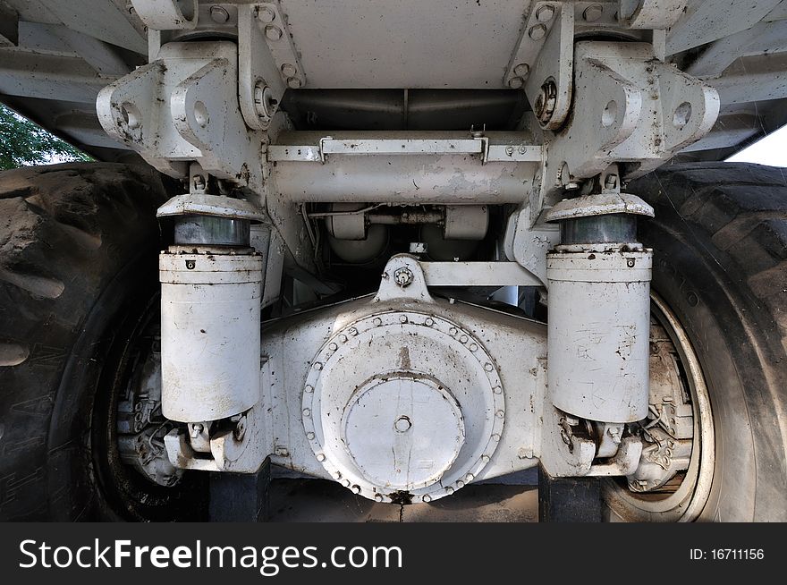 Tyre and vehicle body in symmetrical of big construction loader, shown as working and technology of construct equipment. Tyre and vehicle body in symmetrical of big construction loader, shown as working and technology of construct equipment.