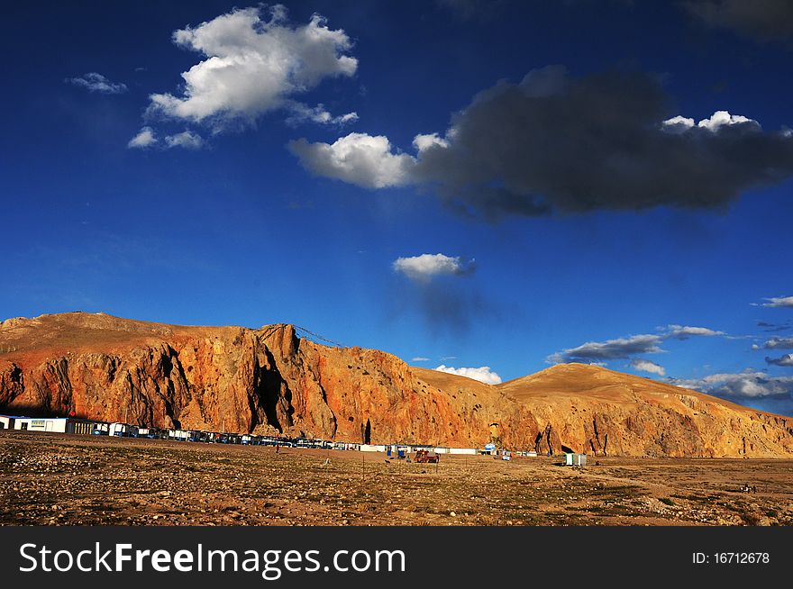 Scenery of a resort at the foot of mountains at sunset in Tibet. Scenery of a resort at the foot of mountains at sunset in Tibet.