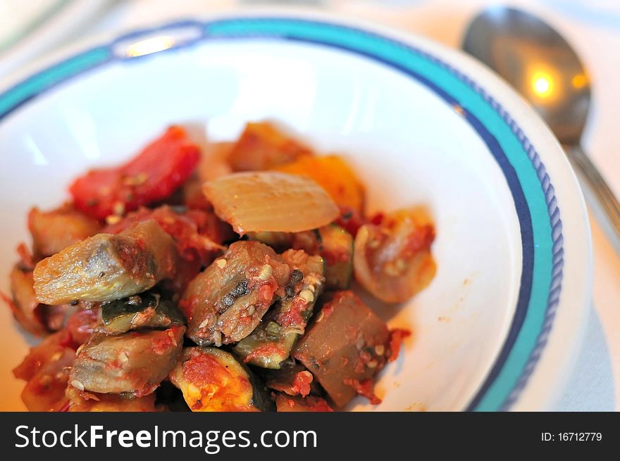 Mushrooms seasoned in spicy tomato sauce and served in bowl. Mushrooms seasoned in spicy tomato sauce and served in bowl.