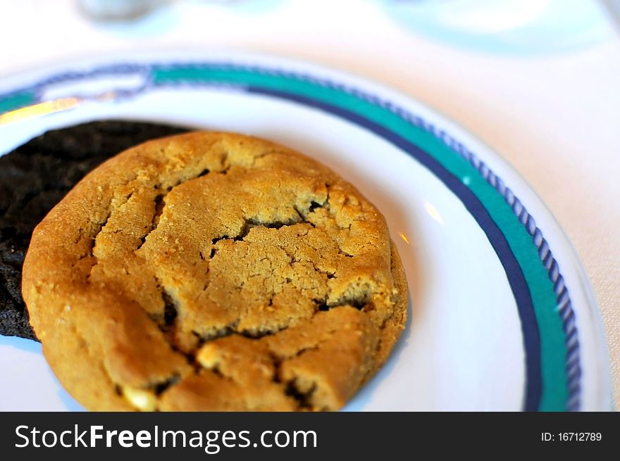 Homemade cookie served as a snack on white plate.
