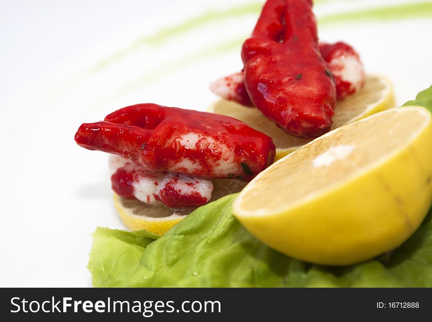 Shrimp salad with lemon isolated in white
