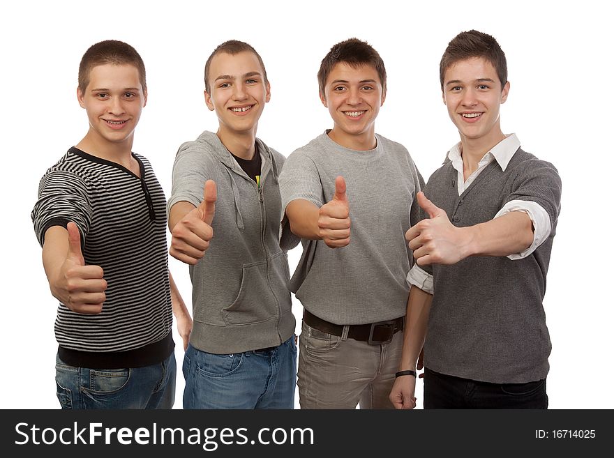 Four young friends gesturing ok. Four young friends gesturing ok