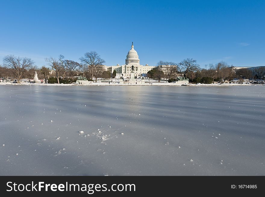 The White House building after a snow blizzard at the Mall in DC, USA. The White House building after a snow blizzard at the Mall in DC, USA