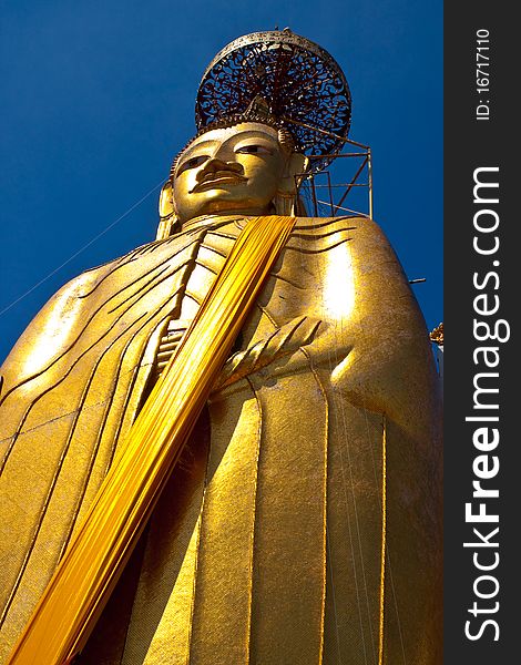 Big gloden monk in thai temple