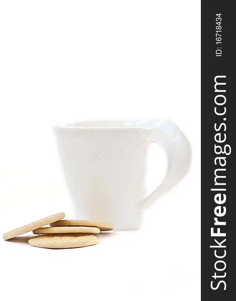 Isolated white mug with cookies. Isolated white mug with cookies