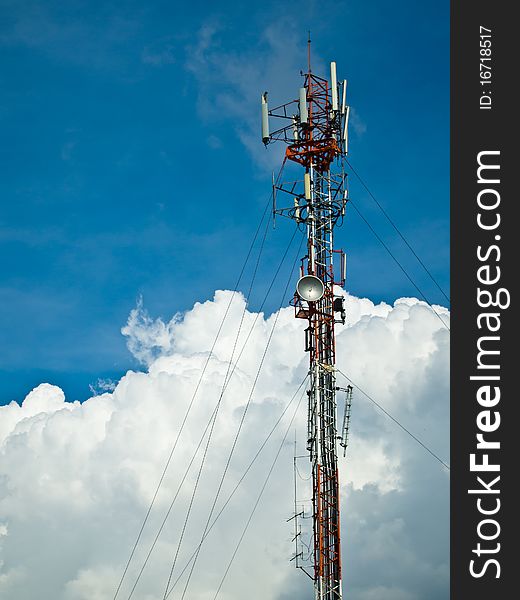 Satellite tower with big bright cloud and blue sky. Satellite tower with big bright cloud and blue sky