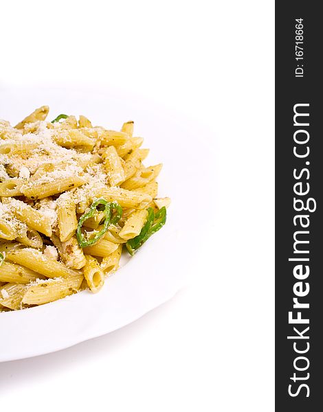 Penne with basil, olive oil and pine dressing (shallow DOF). Penne with basil, olive oil and pine dressing (shallow DOF)