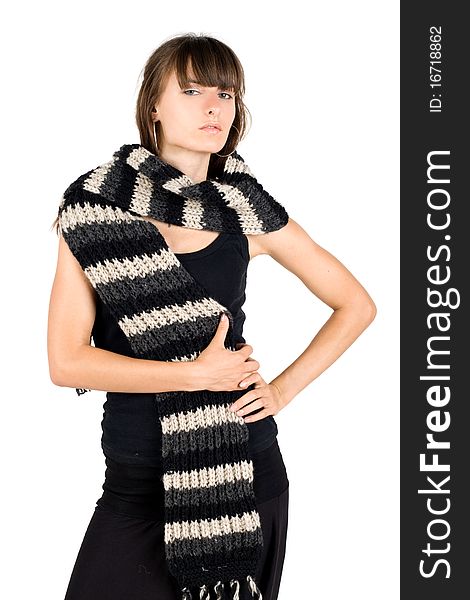 Girl in warm scarf posing in studio. Girl in warm scarf posing in studio