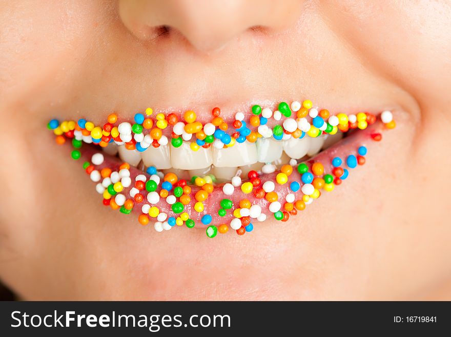 Beautiful lips with lots of sweet candy balls