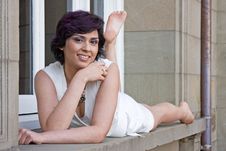 Woman Lying On Window Royalty Free Stock Photo Woman Lying On Window Royalty Free Stock Photo