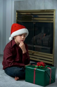 Boy Thinking About Present Stock Photography
