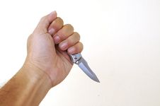 Hand Holding A Knife Stock Photo