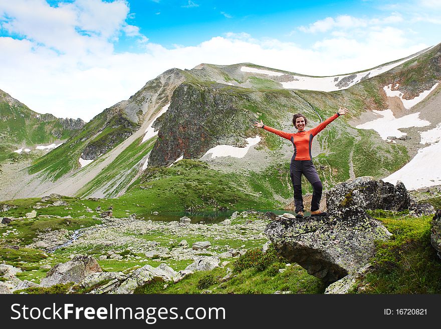 Hiker girl in Caucasus mountains