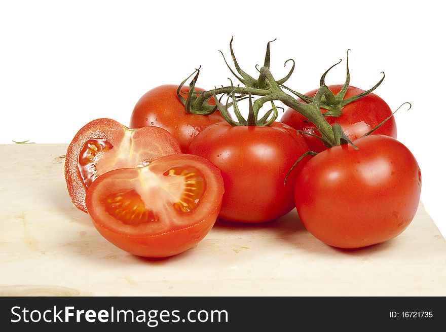 Fresh tomatoes isolated on white