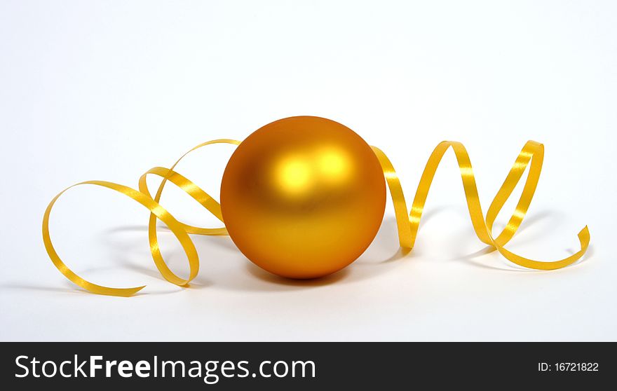 Yellow bauble with the yellow ribbon on the white background. Yellow bauble with the yellow ribbon on the white background