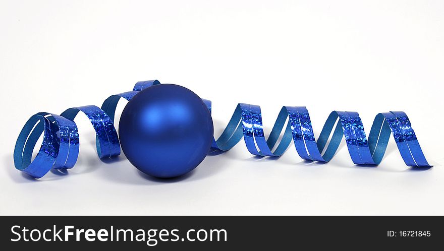 Blue bauble with the blue ribbon on the white background. Blue bauble with the blue ribbon on the white background