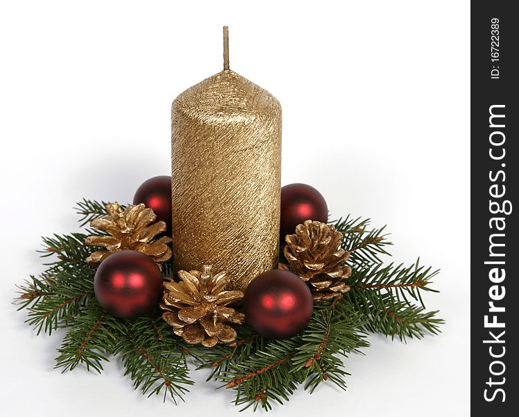 Gold candle with the baubles and cones. Gold candle with the baubles and cones