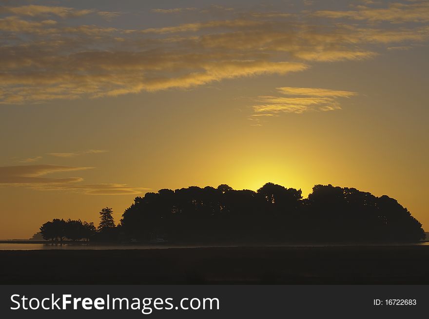 Island sunrise in autumn over poole harbour dorset. Island sunrise in autumn over poole harbour dorset