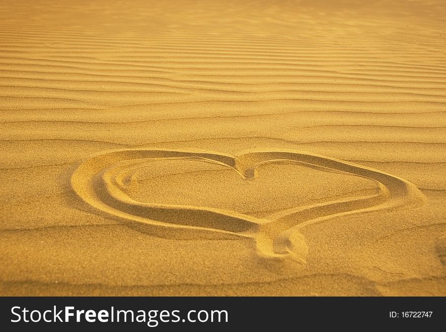 Heart on sand