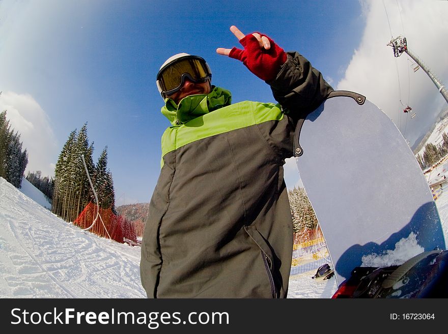Snowboarder boy in sky resourt