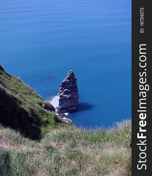 Lonely rock at Cliff of Moher in Ireland