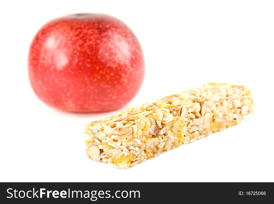 Muesli snack stick with red plum isolated on white. Muesli snack stick with red plum isolated on white