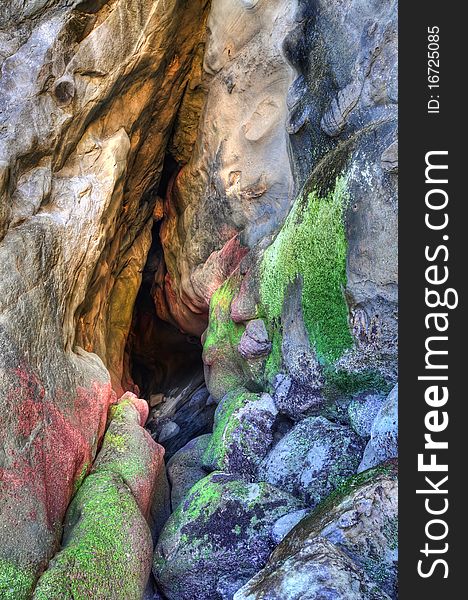 A small dry sea cave. Photograph originally taken on the Oregon coast. A small dry sea cave. Photograph originally taken on the Oregon coast.