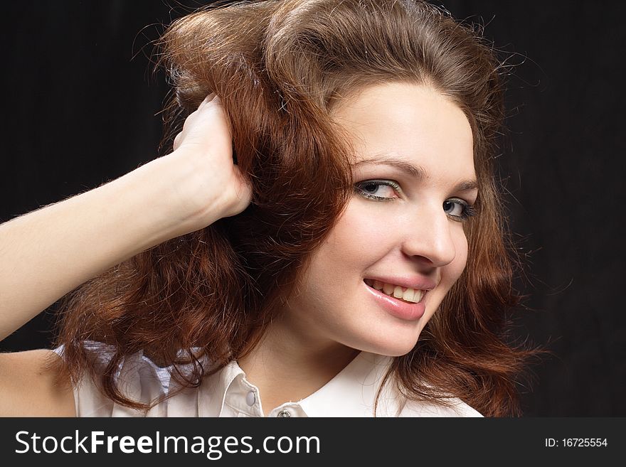 Girl Dishevelled Hair By Hand Isolated Black