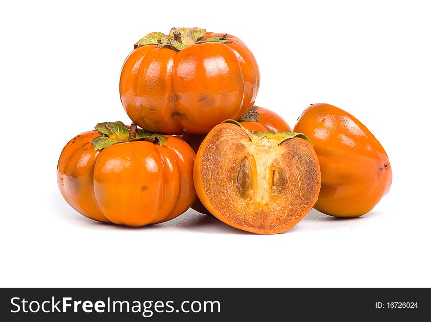 Ripe persimmons isolated on a white background