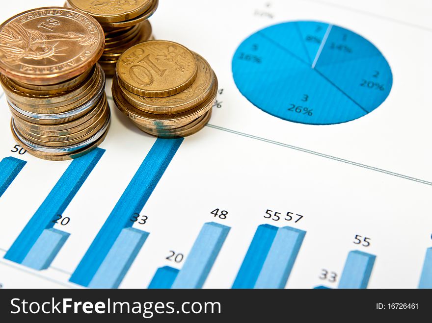 Business graph and chart with stacks of coins. Business graph and chart with stacks of coins