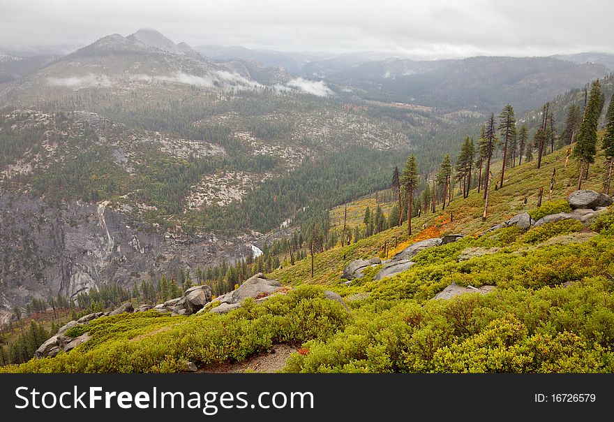 View form Washburn Point on a rainy day in Yosemite National Park, California. View form Washburn Point on a rainy day in Yosemite National Park, California.