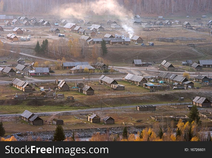 Villages of hemu embraced by forest in xinjiang,china. Villages of hemu embraced by forest in xinjiang,china