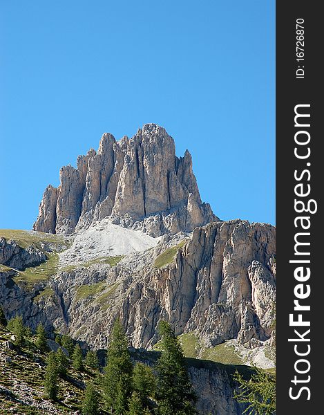 Scenic rocky peak in Italian dolomites - Fassa Valley. Scenic rocky peak in Italian dolomites - Fassa Valley.