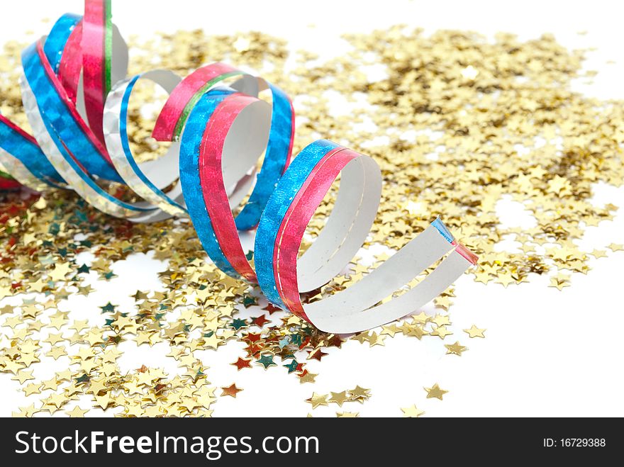 Close up of confetti on white background
