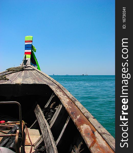 Bow of boat on sea walking in Thai