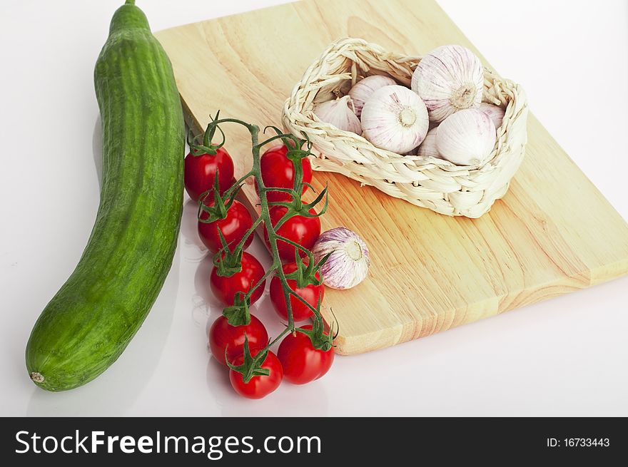 Fresh and healthy vegetables on the white background ready to cook