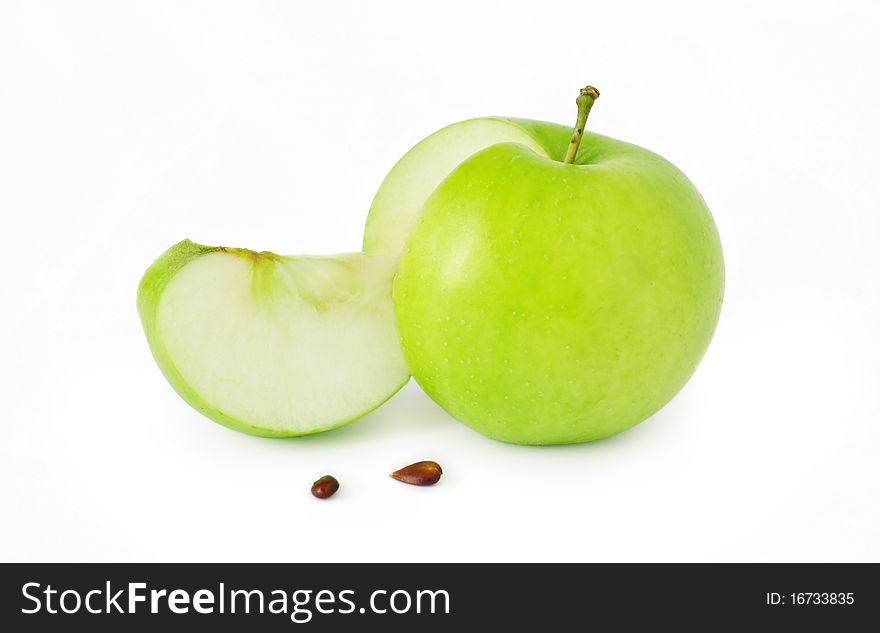 Green apple with cutted segment and seeds. Green apple with cutted segment and seeds