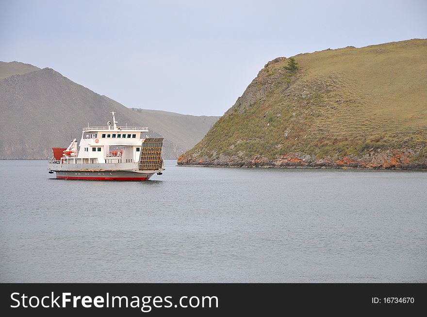 Ferry which goes between big land and Olhon island at Baikal lake. Ferry which goes between big land and Olhon island at Baikal lake
