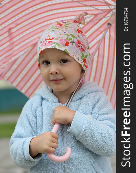 Little girl with pink umbrella. Little girl with pink umbrella