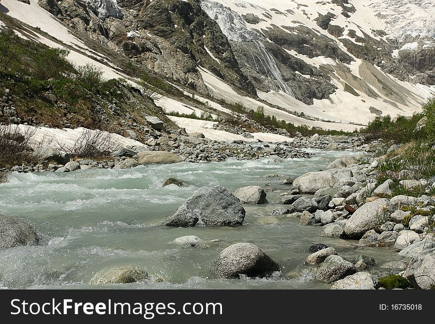 Mountain Tana on Caucasus. Rapid mountain stream. republic North Ossetia, Russian Federation