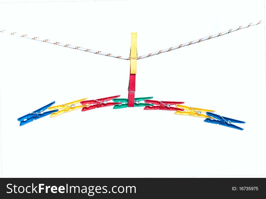 Colorful clothespins on a string