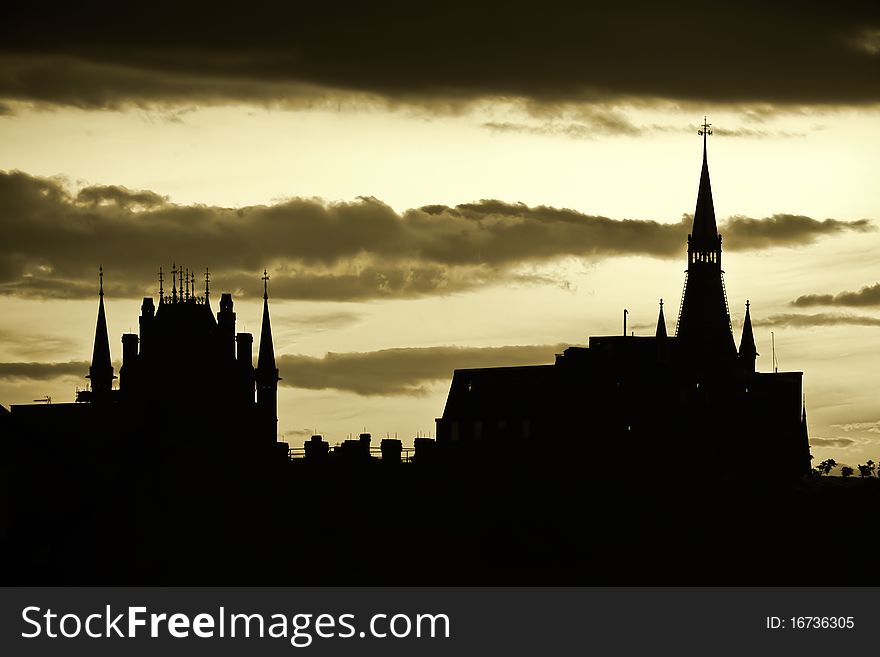 A sunset shot with the skyline of St Pancras Station in London. This is a high contrast image and very suitable for travel guides about London. A sunset shot with the skyline of St Pancras Station in London. This is a high contrast image and very suitable for travel guides about London.