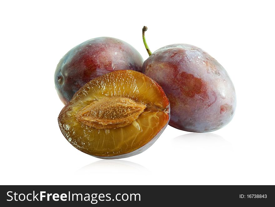 Ripe juicy plum with on a white background. Ripe juicy plum with on a white background