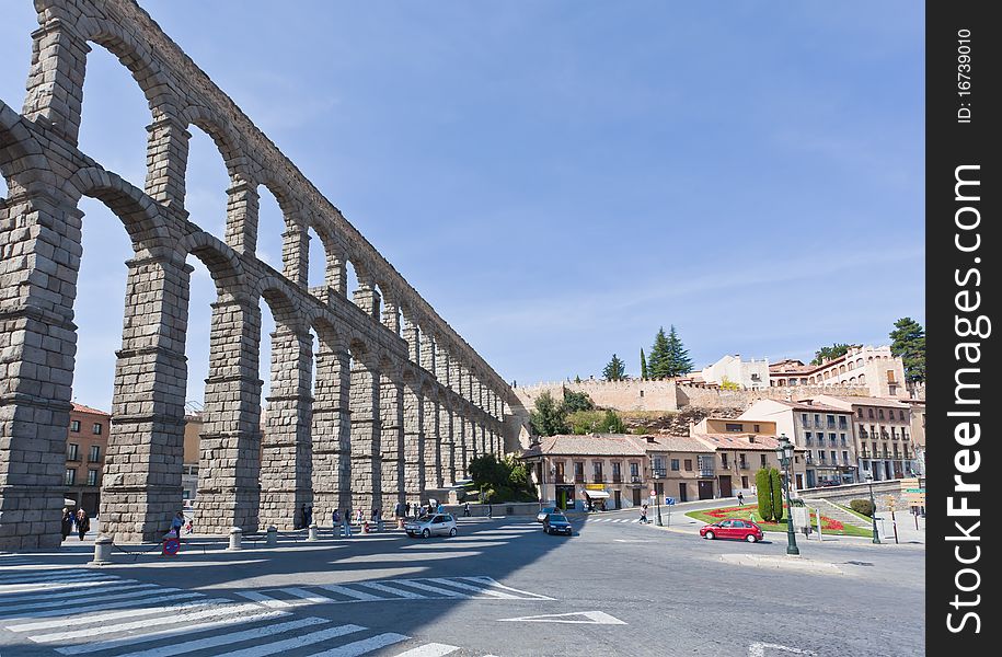The famous ancient aqueduct in Segovia Spain. The famous ancient aqueduct in Segovia Spain