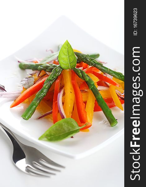 Vegetable salad with asparagus and pepper