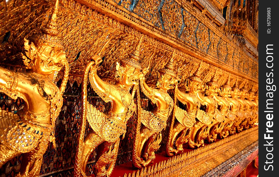 The Golden of Garuda demond guardian around Main Hall Wat Pra Kaew. The Golden of Garuda demond guardian around Main Hall Wat Pra Kaew