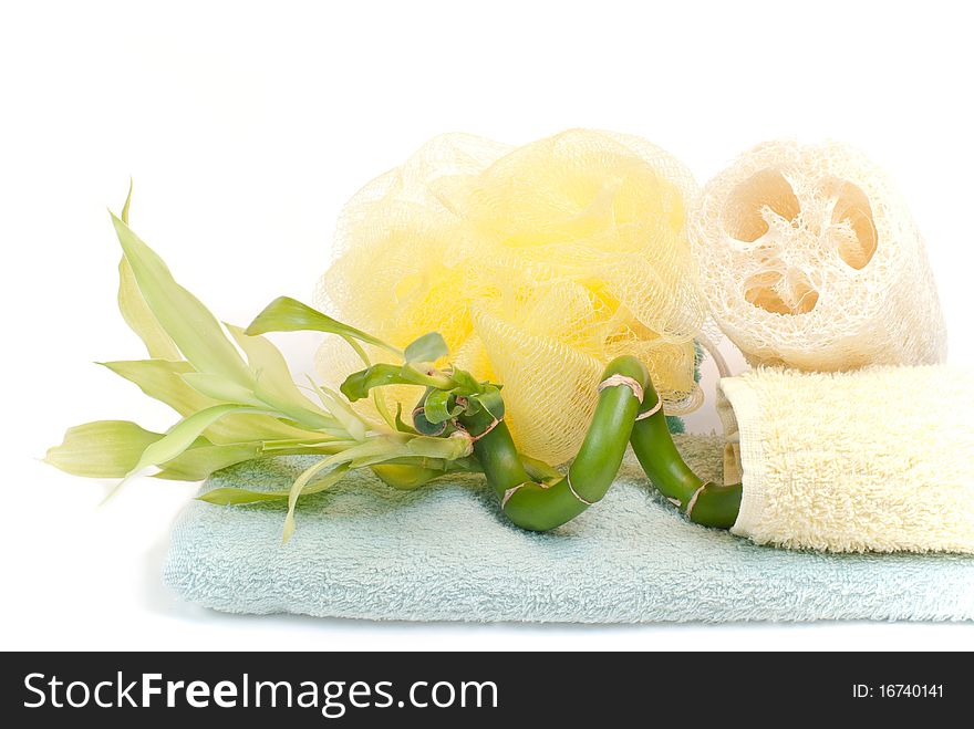 Loofah, bamboo and towels, isolated