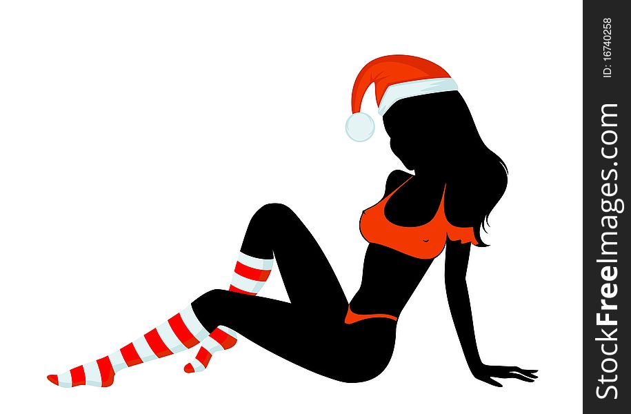 Silhouette of beautiful girl is in socks and cap of Santa Claus.