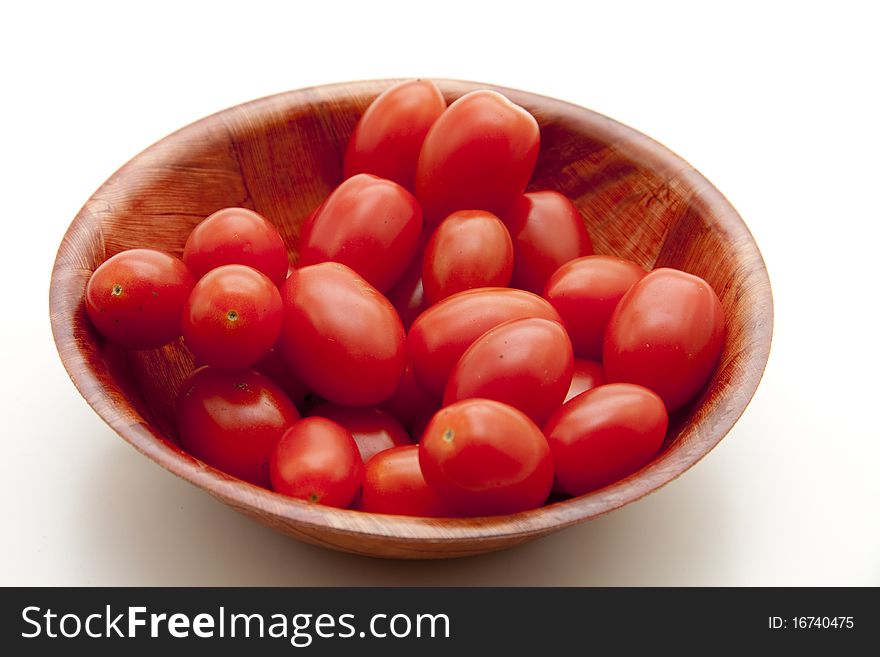 Cherry tomatoes in the wood bowl